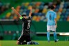 Lyon's Houssem Aouar reacts at the end of the Champions League quarterfinal soccer match between Lyon and Manchester City at the Jose Alvalade stadium in Lisbon, Portugal, Saturday, Aug. 15, 2020. Lyon won the match 3-1. (Miguel A. Lopes/Pool via AP)