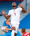 England's Raheem Sterling celebrates after scoring the opening goal from the penalty spot during the UEFA Nations League soccer match between Iceland and England in Reykjavik, Iceland, Saturday, Sept. 5, 2020. (AP Photo/Brynjar Gunnarson)