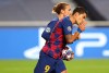 Barcelona's Luis Suarez, right, celebrates with Barcelona's Antoine Griezmann after scoring a goal during the Champions League quarterfinal soccer match between Barcelona and Bayern Munich in Lisbon, Portugal, Friday, Aug. 14, 2020. (Rafael Marchante/Pool via AP)