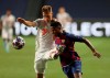 Barcelona's Ansu Fati, right, is challenged by Bayern's Joshua Kimmich during the Champions League quarterfinal soccer match between Barcelona and Bayern Munich in Lisbon, Portugal, Friday, Aug. 14, 2020. (Rafael Marchante/Pool via AP)