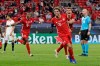 Bayern's Javi Martinez, center, celebrates with teammates after scoring his side's second goal during the UEFA Super Cup soccer match between Bayern Munich and Sevilla at the Puskas Arena in Budapest, Hungary, Thursday, Sept. 24, 2020. (Bernadett Szabo/Pool via AP)