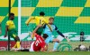 Manchester United's Harry Maguire scores his side's second goal during the FA Cup sixth round soccer match between Norwich City and Manchester United at Carrow Road stadium in Norwich, England, Saturday, June 27, 2020. (Catherine Ivill/Pool via AP)