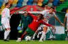 Portugal's Renato Sanches, center, is challenged by Spain's Rodri, right, during the international friendly soccer match between Portugal and Spain at the Jose Alvalade stadium in Lisbon, Wednesday, Oct. 7, 2020. (AP Photo/Armando Franca)