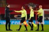 Southampton's manager Ralph Hasenhuettl greets the match officials after the English Premier League soccer match between Southampton and Aston Villa at St. Mary's Stadium in Southampton, England, Saturday, Jan. 30, 2021. (John Walton/Pool via AP)