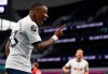 Tottenham's Steven Bergwijn celebrates after scoring the opening goal during the English Premier League soccer match between Tottenham Hotspur and Manchester United at Tottenham Hotspur Stadium in London, England, Friday, June 19, 2020. (AP Photo/Shaun Botterill, Pool)