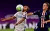 Lyon's Nikita Parris, left, is challenged by PSG's Irene Paredes during the Women's Champions League semifinal soccer match between Lyon and Paris Saint-Germain in Bilbao, Spain, Wednesday, Aug. 26, 2020.(AP Photo/Alvaro Barrientos,Pool)