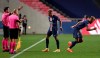 PSG's Kylian Mbappe, center, is substituted for Eric Maxim Choupo-Moting during the Champions League semifinal soccer match between RB Leipzig and Paris Saint-Germain at the Luz stadium in Lisbon, Portugal, Tuesday, Aug. 18, 2020. (AP Photo/Manu Fernandez)