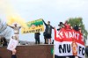 Fans hold up banners as they protest against the Glazer family, owners of Manchester United, before their Premier League match against Liverpool at Old Trafford, Manchester, England, Sunday, May 2, 2021. (Barrington Coombs/PA via AP)