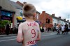 People line the streets as the funeral cortege of former England soccer player Jack Charlton passes through his hometown of Ashington, in Northumberland, England Tuesday July 21, 2020 ahead of his funeral service in Newcastle. Charlton, who won the World Cup playing for England in 1966 and also managed the Ireland team taking them to the World Cup in 1990 and 1994, died on July 10 aged 85. (Owen Humphreys/PA via AP)