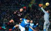 Milan's Zlatan Ibrahimovic, left, heads the ball, during a Serie A soccer match between Brescia and AC Milan, in Brescia, Italy, Friday, Jan. 24, 2020. (Spada/LaPresse via AP)