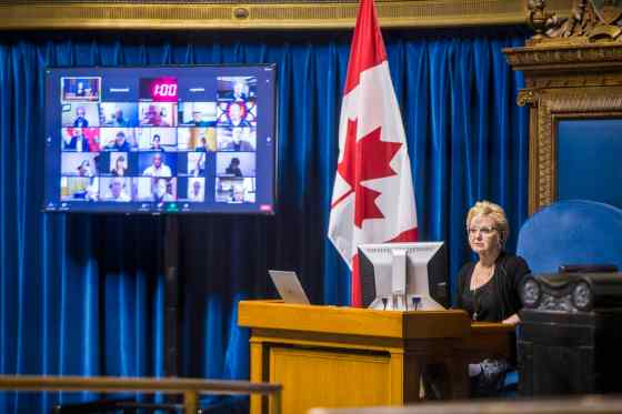 MIKAELA MACKENZIE / WINNIPEG FREE PRESSSpeaker Myrna Driedger runs through a semi-virtual throne speech rehearsal, with some MLAs in the chamber while others connected via video-conferencing at the Manitoba Legislative Building in Winnipeg on Tuesday.