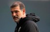 FILE - In this Dec. 6, 2020, file photo, West Bromwich Albion's manager Slaven Bilic is interviewed after the English Premier League soccer match between West Bromwich Albion and Crystal Palace at the Hawthorns in West Bromwich, England. Bilic’s appointment as head coach of Beijing Guoan might be the exception rather than the rule when it comes to big-name soccer talent heading to China after Chinese Super League authorities moved to reduce club spending. Bilic was fired by English Premier League team West Bromich Albion in December. (Mike Egerton/Pool Photo via AP, File)