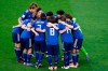 FILE - In this June 25, 2019, file photo, Japan players embrace ahead of the Women's World Cup round of 16 soccer match between the Netherlands and Japan at Roazhon Park, in Rennes, France. The Japan Football Association is expected to pull out of bidding for the 2023 Women’s World Cup, according to a report by Japanese news agency Kyodo on Monday, June 22, 2020. (AP Photo/Francois Mori, File)