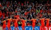 FILE - In this Jan. 20, 2019, file photo, Chinese players greet supporters at the end of the AFC Asian Cup round of 16 soccer match between Thailand and China at the Hazza Bin Zayed stadium in Al Ain, United Arab Emirates.Barely weeks into the new decade, Chinese soccer’s “2020 Action Plan” is in tatters after another international tournament failure that ended with players leaving the field in tears after losing all three games without scoring a goal. China's Football Association set a number of targets for the men’s national teams at various age levels to meet by this year. None have been met. (AP Photo/Hassan Ammar, File)