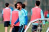 FILE - In this Feb. 18, 2016, file photo, Brazil's Alex Teixeira smiles while practicing with his Jiangsu Suning teammates in Nanjing in eastern China's Jiangsu province. Chinese Super League champion Jiangsu FC announced Sunday, Feb. 28, 2021 it would “cease operations” with immediate effect, just three months after winning its first title. Nanjing-based Jiangsu, which is owned by retail giant Suning that also holds a majority stake in Italian league leader Inter Milan, said on social media that it hoped that a new backer could be found after the company pulled out. (Chinatopix via AP, File)