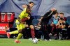 Atlanta United coach Gabriel Heinze, right, reacts to a play as Nashville SC defender Nick Hinds, left, and Atlanta defender George Bello (21) vie for the ball during the first half of an MLS soccer match Thursday, July 8, 2021, in Nashville, Tenn. (AP Photo/Mark Humphrey)
