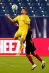 Nashville SC forward Alan Winn blocks the ball in front of Atlanta United defender Miles Robinson (12) during the second half of an MLS soccer match Saturday, Sept. 12, 2020, in Nashville, Tenn. Nashville SC won 4-2. (AP Photo/Mark Humphrey)