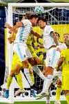 Minnesota United forward Aaron Schoenfeld, left, and defender Jose Aja (4) head the ball in front of the Nashville SC goal during the first half of an MLS soccer match Tuesday, Oct. 6, 2020, in Nashville, Tenn. (AP Photo/Mark Humphrey)
