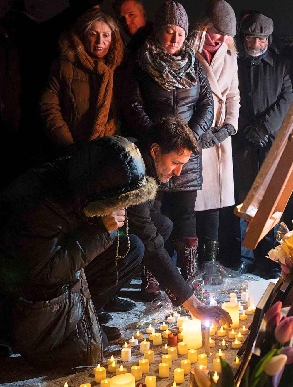 Adrian Wyld / THE CANADIAN PRESS
Prime Minister Justin Trudeau participates in a candlelight vigil to remember those killed on Ukraine International Airlines Flight on Thursday in Ottawa.