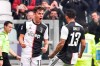 Juventus' Paulo Dybala, left, celebrates scoring his side's opening goal during the Serie A soccer match between Juventus and Brescia, a the Allianz Stadium in Turin, Italy, Sunday, Feb. 16, 2020. (Marco Alpozzi/Lapresse via AP)