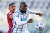 Inter's Romelu Lukaku, right, and Torino's Bremer Gleison vie for the ball during the Italian Serie A soccer match between Torino and Inter Milan at the Olimpico Grande Torino stadium in Turin, Italy, Sunday, March 14, 2021. (Fabio Ferrari/LaPresse via AP)