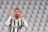 Juventus' Cristiano Ronaldo reacts after missing a scoring chance, during the Serie A soccer match between Juventus and Atalanta, at the Allianz Stadium in Turin, Italy, Wednesday, Dec. 16, 2020. (Marco Alpozzi/LaPresse via AP)