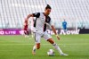 Juventus' Cristiano Ronaldo goes for the ball during the Serie A soccer match between Juventus and Torino, at the Allianz Stadium in Turin, Italy, Saturday, July 4, 2020. Juventus goalkeeper Gianluigi Buffon set an outright Serie A record on Saturday with his 648th appearance in Italy’s top flight. The Turin derby game against Torino moved the 42-year-old Buffon one ahead of AC Milan great Paolo Maldini, who set the record in 2009. (Marco Alpozzi/LaPresse via AP)