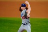 Los Angeles Dodgers starting pitcher Dustin May delivers to the San Diego Padres during the first inning in Game 3 of a baseball National League Division Series Thursday, Oct. 8, 2020, in Arlington, Texas. (AP Photo/Tony Gutierrez)