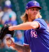 Texas Rangers pitcher Mike Foltynewicz delivers during the first inning of a spring training game against the Los Angeles Dodgers at Surprise Stadium on Sunday, March 7, 2021, in Surprise, Ariz. (Smiley N. Pool/The Dallas Morning News via AP)