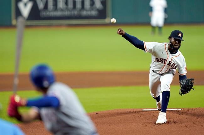 Houston Astros starting pitcher Cristian Javier, right, throws to Texas Rangers' Shin-Soo Choo during the first inning of a baseball game Wednesday, Sept. 2, 2020, in Houston. (AP Photo/David J. Phillip)