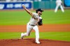 Houston Astros starting pitcher Lance McCullers Jr. throws against the San Francisco Giants during the first inning of a baseball game Monday, Aug. 10, 2020, in Houston. (AP Photo/David J. Phillip)