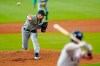 Seattle Mariners starting pitcher Kendall Graveman, left, throws to Houston Astros' Alex Bregman during the first inning of a baseball game Monday, July 27, 2020, in Houston. (AP Photo/David J. Phillip)
