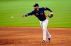 Houston Astros first baseman Yuli Gurriel tosses the ball during a simulated baseball game Thursday, July 9, 2020, in Houston. (AP Photo/David J. Phillip)
