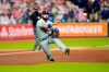 Texas Rangers third baseman Isiah Kiner-Falefa throws to first for the out after fielding a ground ball by Houston Astros' Alex Bregman during the third inning of a baseball game Thursday, Sept. 17, 2020, in Houston. (AP Photo/David J. Phillip)