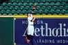 Houston Astros right fielder Josh Reddick reaches for a home run by Arizona Diamondbacks' Kole Calhoun during the eighth inning of a baseball game Friday, Sept. 18, 2020, in Houston. (AP Photo/David J. Phillip)