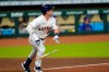 Houston Astros' Alex Bregman watches his two-run single against the Texas Rangers during the seventh inning of a baseball game Tuesday, Sept. 15, 2020, in Houston. (AP Photo/David J. Phillip)