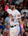Houston Astros' Kyle Tucker celebrates his three-run home run during the fourth inning of a baseball game against the Toronto Blue Jays, Sunday, May 9, 2021, in Houston. (AP Photo/Eric Christian Smith)