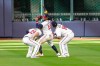Atlanta Braves' Ronald Acuna Jr., center, celebrates with teammates Adam Duvall, left, and Cristian Pache, right, after Game 1 of a baseball National League Division Series against the Miami Marlins Tuesday, Oct. 6, 2020, in Houston. (AP Photo/Michael Wyke)
