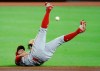 Los Angeles Angels shortstop David Fletcher makes a throw from his back on a base hit by the Houston Astros' Carlos Correa in the bottom of the first inning during the first game of a doubleheader on Tuesday, August 25, 2020, at Minute Maid Park. (Kevin M. Cox/The Galveston County Daily News via AP)
