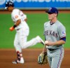 Texas Rangers starting pitcher Kolby Allard reacts after giving up a two-run home run to the Houston Astros' Michael Brantley in the bottom of the first inning of a baseball game, Wednesday, Sept. 2, 2020 in Houston.(Kevin M. Cox/The Galveston County Daily News via AP)