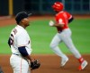 Houston Astros starting pitcher Framber Valdez, left, reacts after giving up a solo home run to Los Angeles Angels' Justin Upton in the top of the fourth inning on Monday, Aug. 24, 2020, in Houston. (Kevin M. Cox/The Galveston County Daily News via AP)