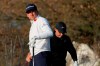Ian Poulter, of England, watches his shot off the fifth tee as Rory McIlroy, of Northern Ireland, readies for his shot, during a first round match at the Dell Technologies Match Play Championship golf tournament Wednesday, March 24, 2021, in Austin, Texas. (AP Photo/David J. Phillip)