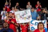 A young United States fan holds up a sign advocating for equal pay for women's soccer players after the United States defeated Japan in a SheBelieves Cup women's soccer match, Wednesday, March 11, 2020 at Toyota Stadium in Frisco, Texas. (AP Photo/Jeffrey McWhorter)