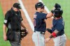Boston Red Sox Hunter Renfroe, center, is greeted at home plate by Christian Vazquez after his two-run home run in the second inning of a baseball game in Arlington, Texas, Saturday, May 1, 2021. (AP Photo/Louis DeLuca)