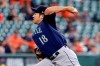 Seattle Mariners starting pitcher Yusei Kikuchi (18) throws against the Houston Astros during the first inning of a baseball game Thursday, April 29, 2021, in Houston. (AP Photo/Michael Wyke)