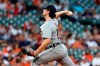 Detroit Tigers starting pitcher Casey Mize throws against the Houston Astros during the first inning of a baseball game Monday, April 12, 2021, in Houston. (AP Photo/Michael Wyke)