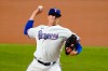 Texas Rangers starting pitcher Kyle Gibson throws to the Boston Red Sox in the first inning of a baseball game in Arlington, Texas, Thursday, April 29, 2021. (AP Photo/Tony Gutierrez)