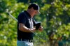 Phil Mickelson refers to his notes as he walks up onto the 14th green during the second round of the Northern Trust golf tournament at TPC Boston, Friday, Aug. 21, 2020, in Norton, Mass. (AP Photo/Charles Krupa)