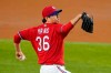 Texas Rangers relief pitcher Hyeon-Jong Yang throws to a Boston Red Sox batter during the third inning of a baseball game in Arlington, Texas, Friday, April 30, 2021. (AP Photo/Tony Gutierrez)