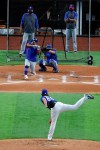 Texas Rangers' Luke Farrell throws to Willie Calhoun as catcher Jeff Mathis, pitching coach Julio Rangel, left rear and manager Chris Woodward, right rear, look on during a baseball practice at Globe Life Field in Arlington, Texas, Friday, July 3, 2020. (AP Photo/Tony Gutierrez)